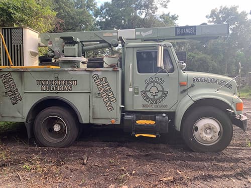 J&B Tree Service crew and equipment on site